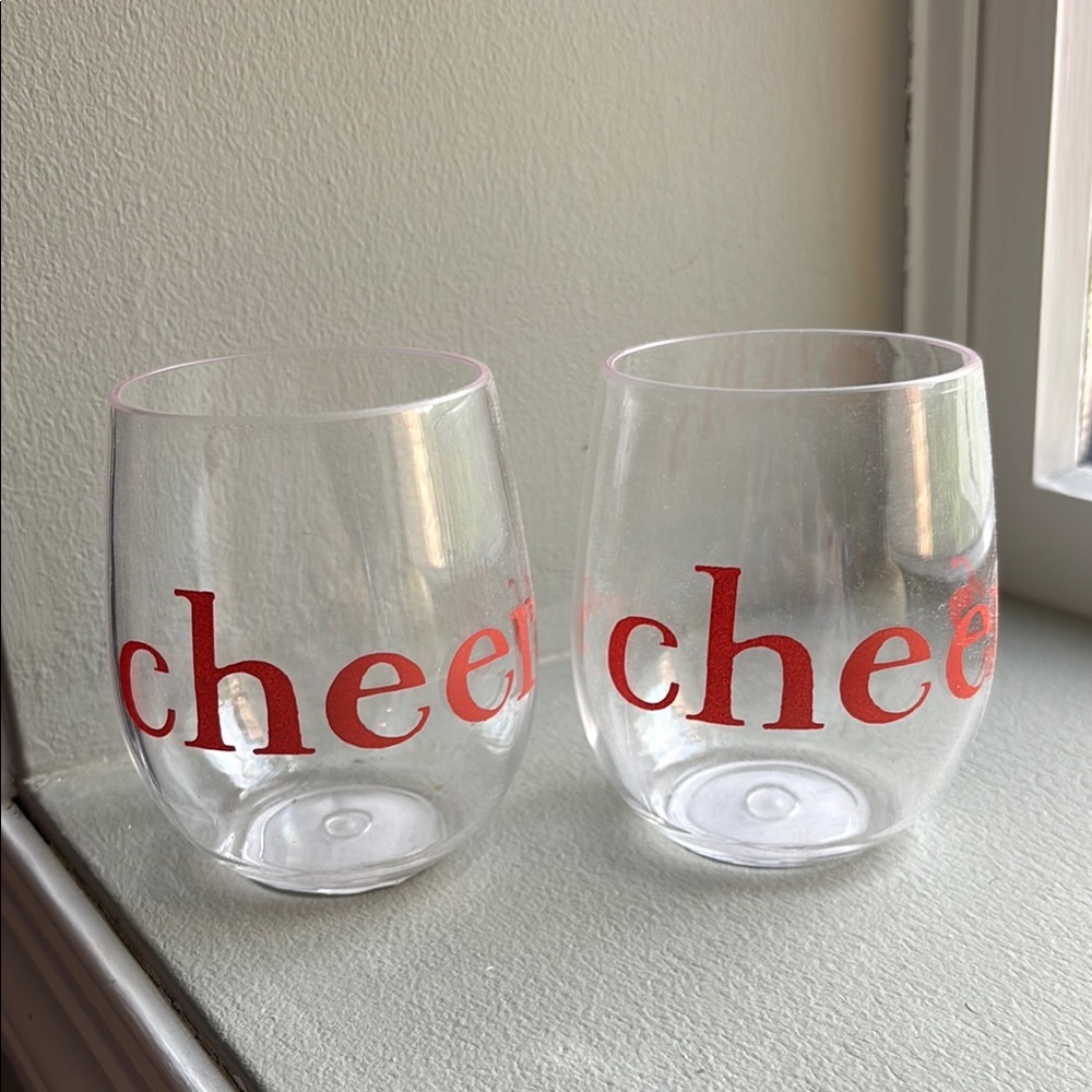 Set of Two Stemless Wine Glasses with Red 'Cheers', never used